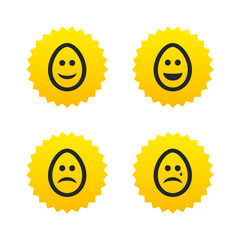 Eggs happy and sad faces signs. Easter icons.