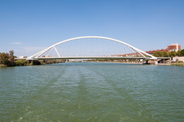 Naklejka premium The Puente de la Barqueta over Guadalquivir River in Seville