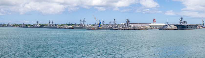 Fototapeta premium United States naval ships in Pearl Harbor USA. Pearl Harbor is the headquarters of the United States Pacific Fleet.
