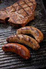 Grilled Sausages and T-Bone Steak