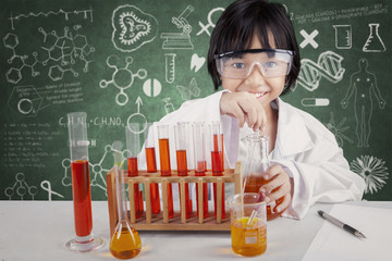Girl making chemical experiments