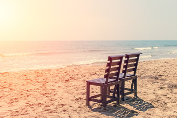 Empty Two Wood Chair on The Beach in Sunny day, Low Season Sea Travel No Tourist Concept.