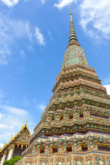 beautiful pagoda with blue sky background at Wat Pho temple, Bangkok, Thailand