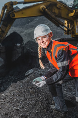 Worker with coal in the hands