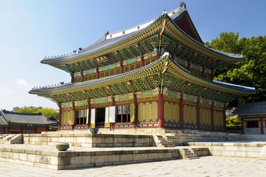 Seoul South Korea old historic tourist sight Changdeok Palace building in traditional korean painted design photo