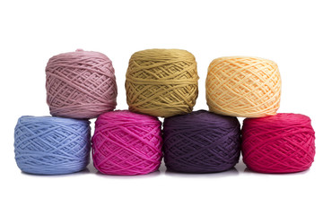 Colorful balls of woolen yarn isolated