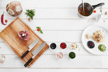 Ingredients for cooking, raw food, flat lay. Products for making mediterranean meal, white wooden background, copy space. Italian cuisine, culinary classes, restaurant kitchen concept