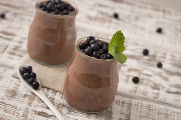 Fototapeta na wymiar Healthy breakfast or morning snack with chia seeds chocolate pud