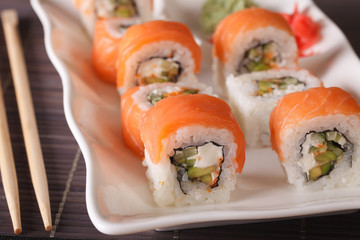 Serving Philadelphia rolls with wasabi and ginger macro. horizontal
