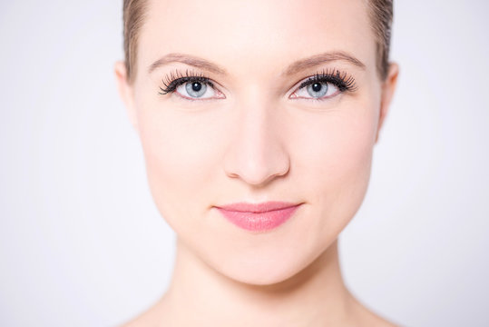 Face close up of a glamorous makeup woman