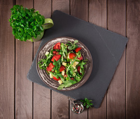 vegetable salad on wooden table. top view