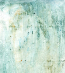 Abstract mixed media background texture in faded faded blue