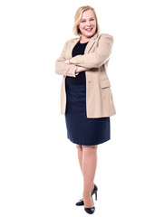 Stylish lady posing with arms crossed