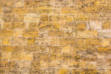 Fototapeta premium The wall of sand stone texture background