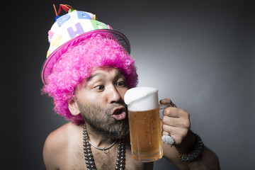 Droll expression uncle have a beer mug