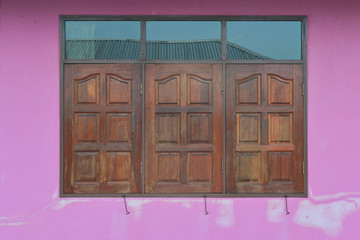 Windows on the pink walls - Powered by Adobe
