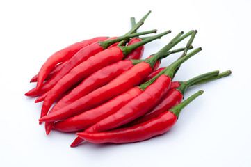 Red hot chili peppers on white background