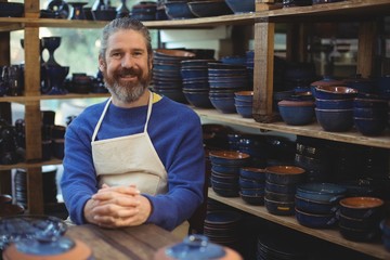 Portrait of male potter smiling