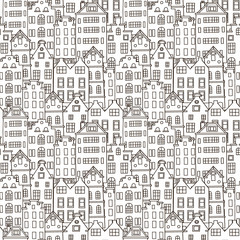 Seamless pattern with cute houses in black and white colors