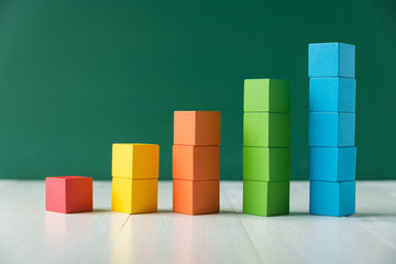 Colorful stack of wood cube building blocks