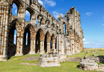 WHITBY, ENGLAND - AUGUST 12: Tourist visiting the ruins of Whitby Abbey. In Whitby, North Yorkshire, England. On 12th August 2016