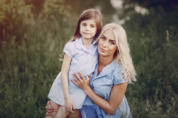 mom and daughter outside