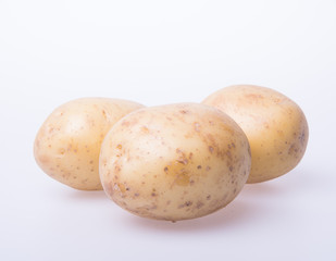 potato or organic potato on a background.