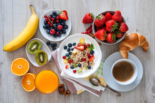 Healthy breakfast.Yogurt with muesli and fresh fruits