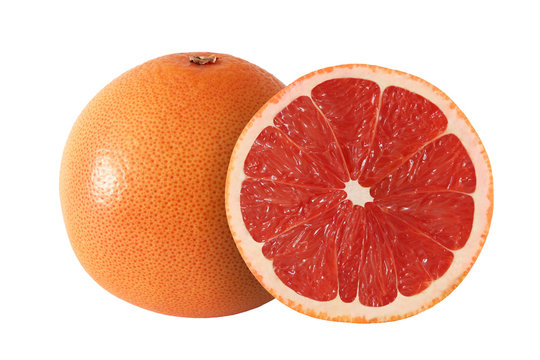 cut and whole grapefruit fruits isolated on white background wit