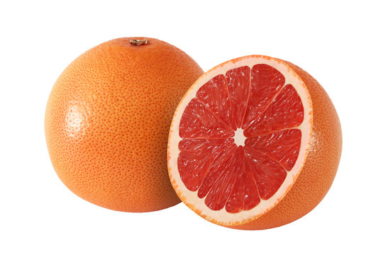 cut and whole grapefruit fruits isolated on white background wit