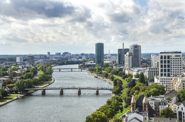 Aerial view of Holbeinsteg pedestrian suspension bridge over the river Main in Frankfurt am Main, Germany.