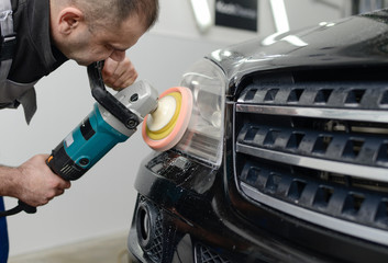 polished black car glossing