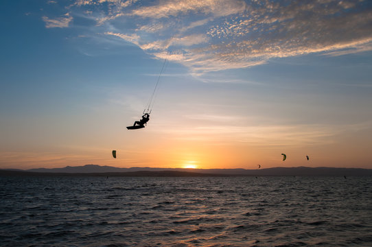 Paracas, Peru - MARCH 30, 2016:  Unidentified kitesurfer makes a trick, documentary editorial.