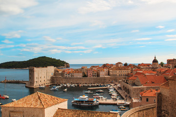 Top view of the orange tile roofs and the sea in the Italian style in Dubrovnik, Croatia
