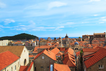 Top view of the orange tile roofs and the sea in the Italian style in Dubrovnik, Croatia