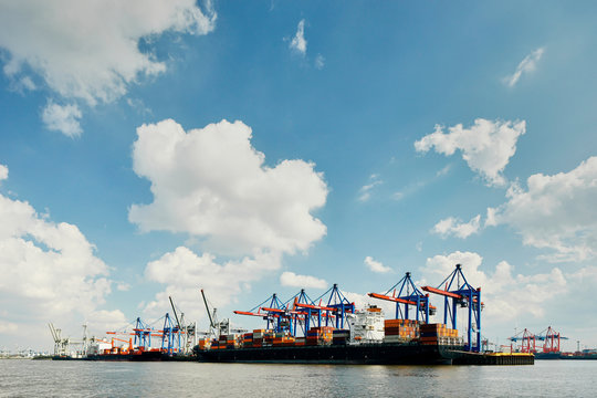 Row of loading cranes on river Elbe, Port of Hamburg, Germany