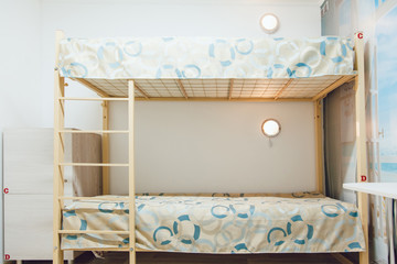 Obraz na płótnie Canvas Hostel interior - bedroom. double bed. interior