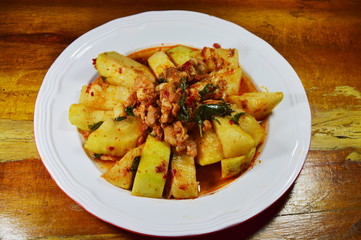 spicy stir fried winter melon with minced pork on dish