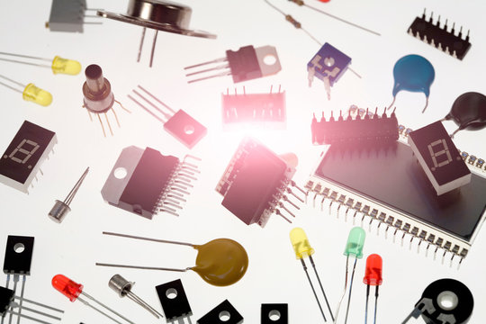 Variety of diode and transistors, white background