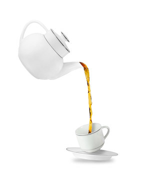 Fototapeta Wlewając herbatę do filiżanki herbaty. Teapot i filiżanka odizolowywający na białym tle