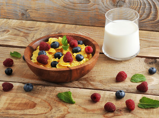 cereal and milk with blueberries and raspberries