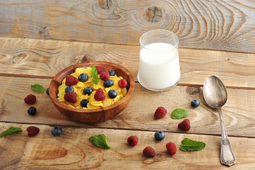 cereal and milk with blueberries and raspberries