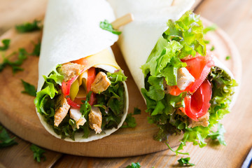 Meat and vegetables wrapped in a tortilla