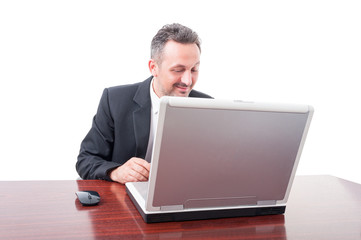 Fototapeta na wymiar Happy executive manager reading something on laptop