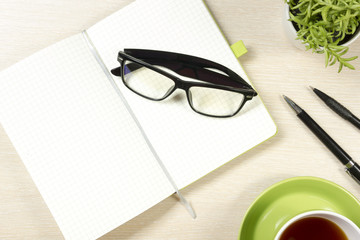 Office desk table with supplies. Top view. Copy space for text