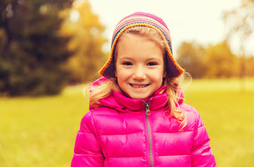 happy beautiful little girl portrait outdoors