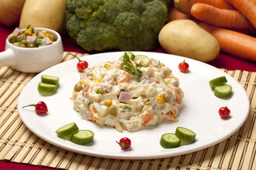 Potato salad with vegetables and mayonnaise. Vegetables backgrou