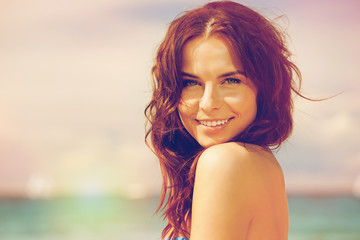Naklejka premium beautiful woman on a beach