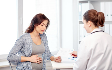 gynecologist doctor and pregnant woman at hospital
