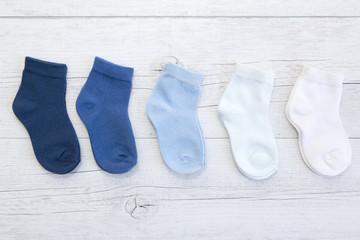 Baby socks with different shades of blue